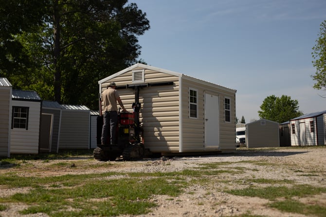 A shed being moved for delivery