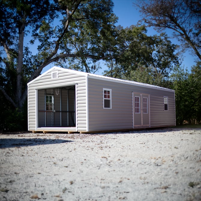 A storage building sitting on a solid gravel foundation