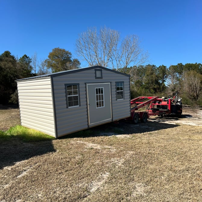 An Action Buildings shed being delivered to a customer site
